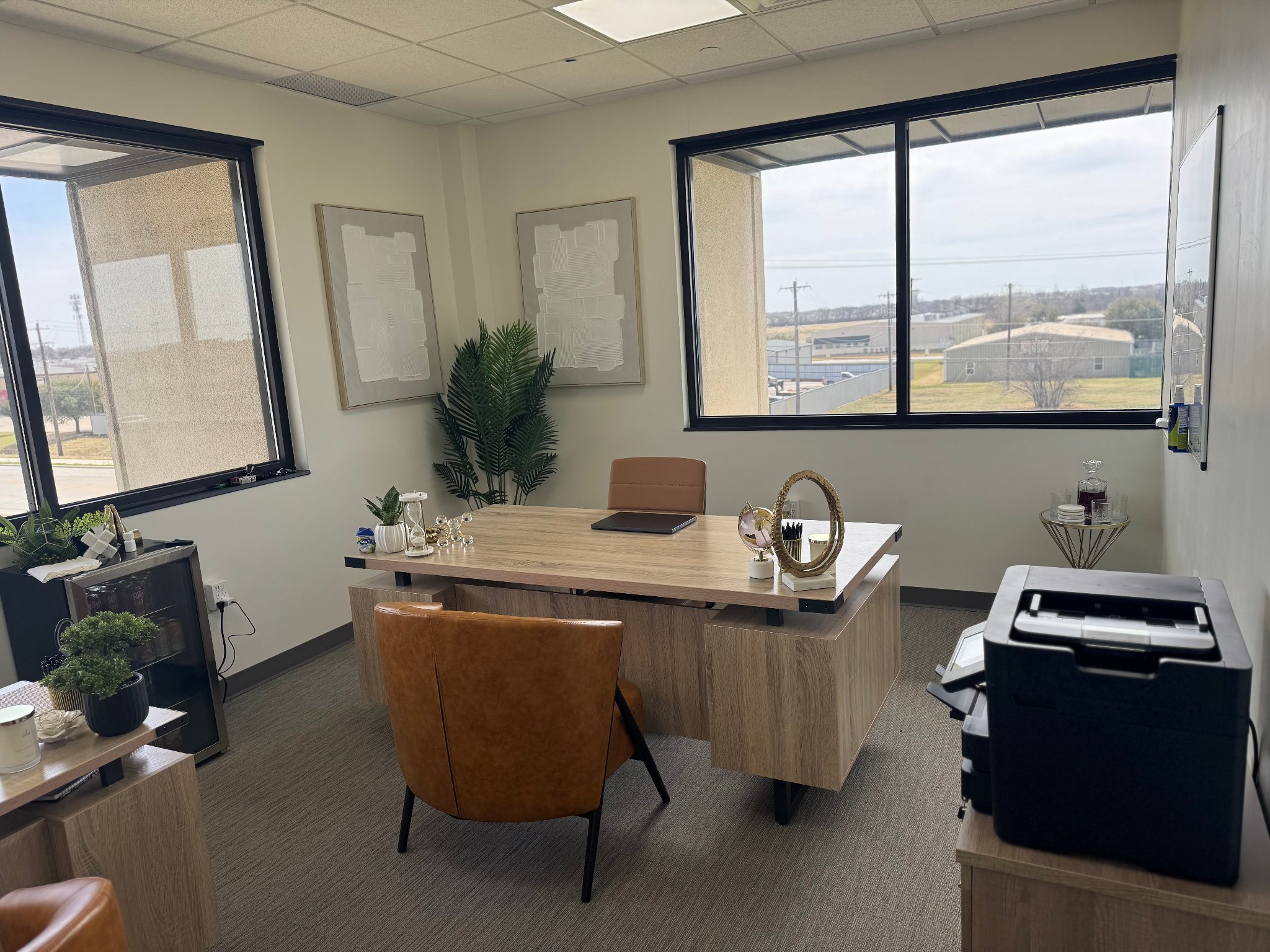 Private executive office with windows and natural light